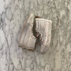 White leather high top Vans sneakers